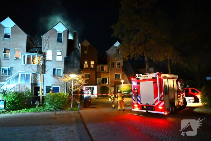 Persoon gered uit brandende woning