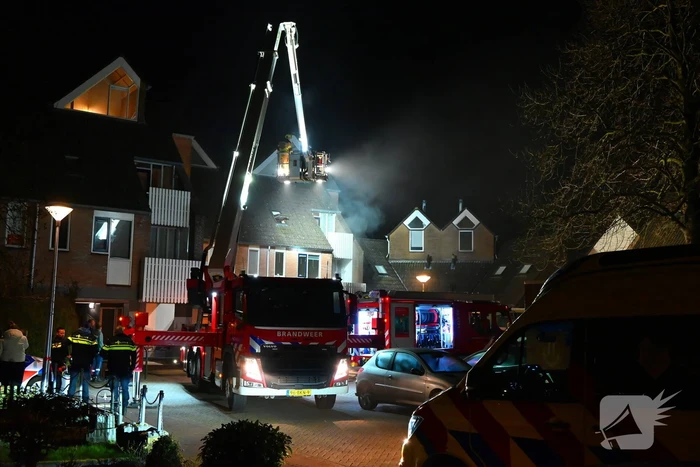 Persoon gered uit brandende woning