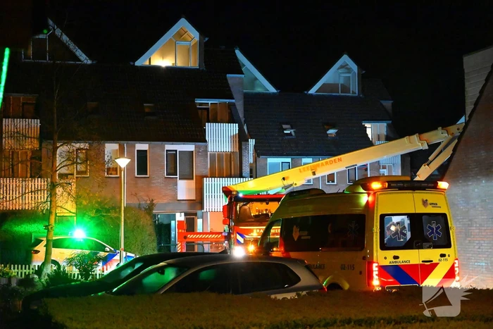 Persoon gered uit brandende woning