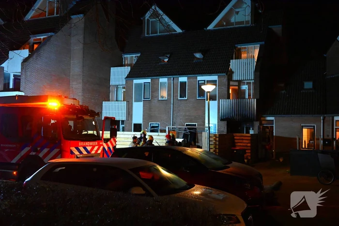 Persoon gered uit brandende woning