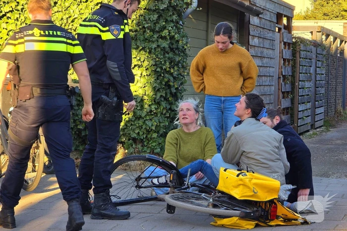 Brandweer bevrijdt Kind uit fietswiel