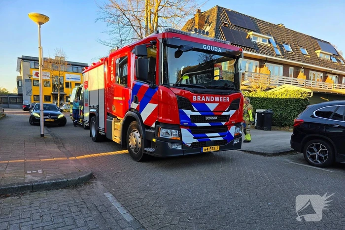 Brandweer bevrijdt Kind uit fietswiel