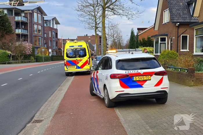 Fietser botst tegen openstaand portier