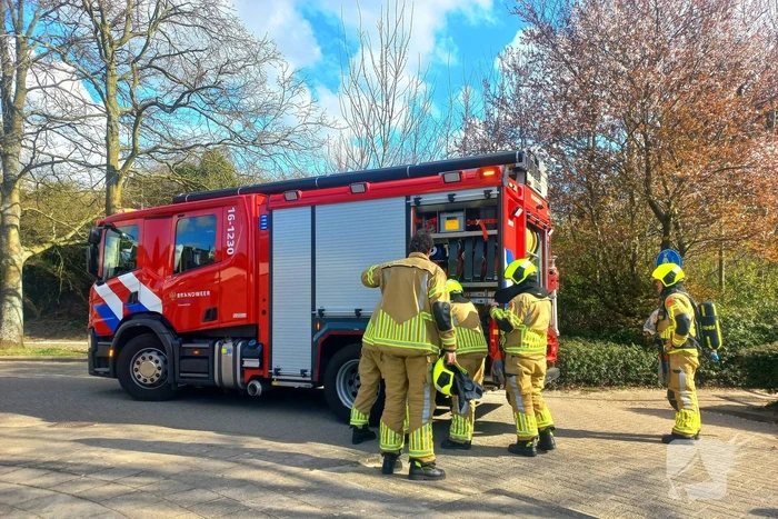 Brandweer blust buitenbrand