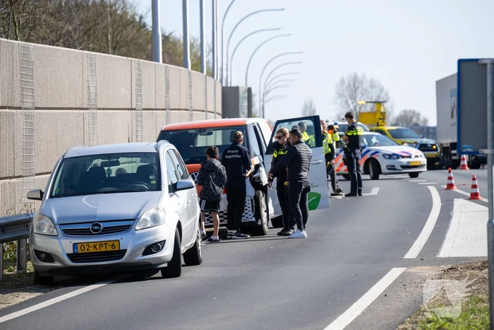 Schade en vertraging na kop-staartbotsing