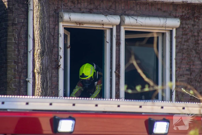 Dode aangetroffen bij woningbrand