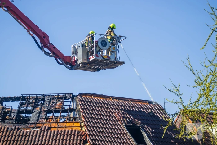 Dode aangetroffen bij woningbrand