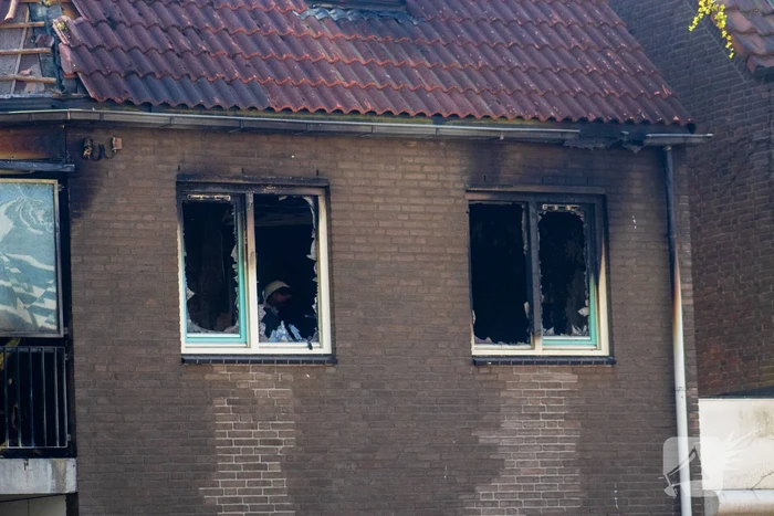 Dode aangetroffen bij woningbrand
