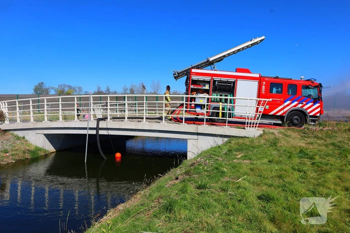 Brand in riet geblust door brandweer