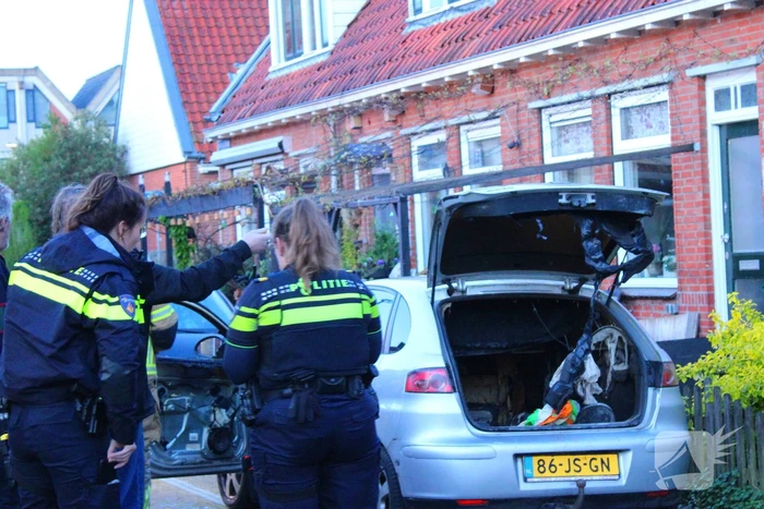 Binnenkant auto zwart door brand