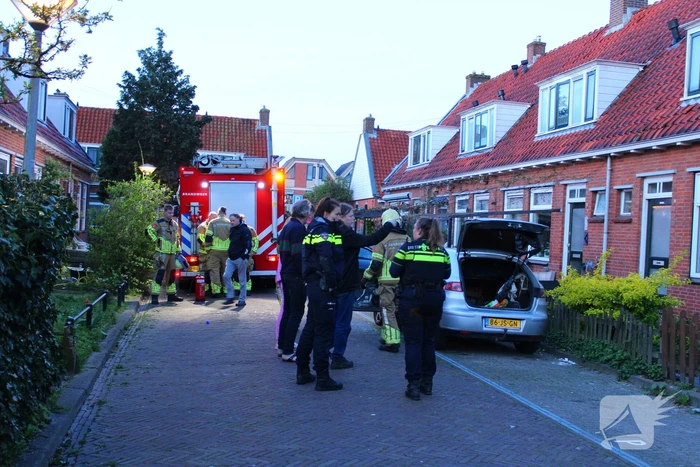 Binnenkant auto zwart door brand