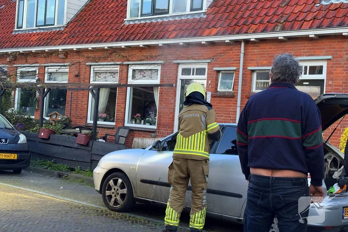 Binnenkant auto zwart door brand