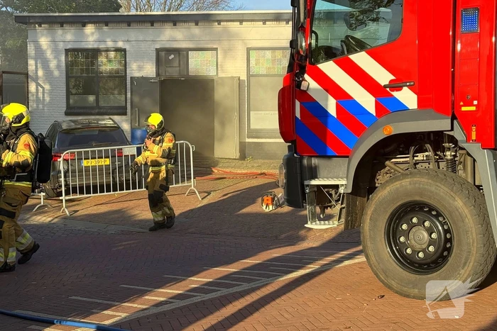 Brandweer blust brand in cafe