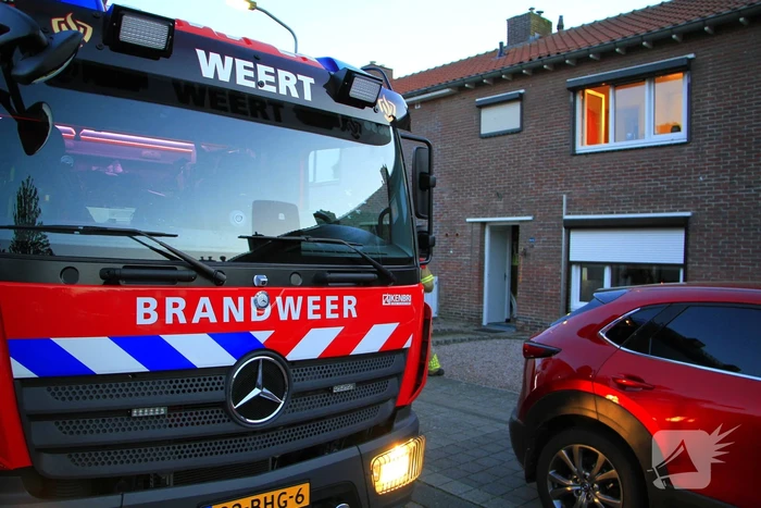 Brandweer klimt naar binnen om vrouw op traplift te bevrijden