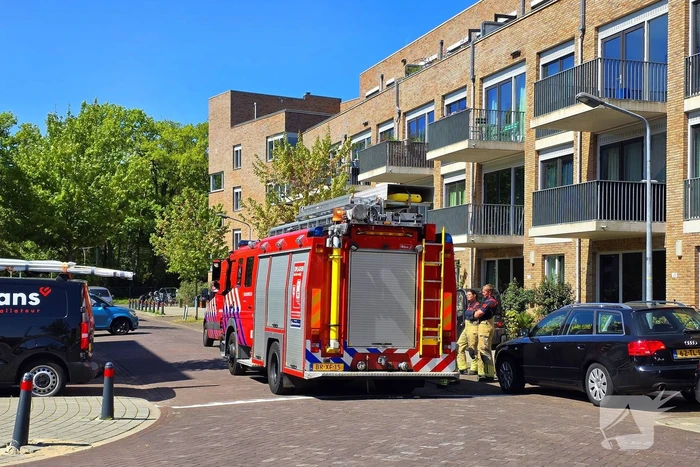 Palletkachel veroorzaakt brandmelding in flatwoning