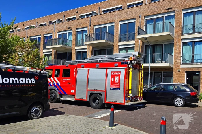 Palletkachel veroorzaakt brandmelding in flatwoning