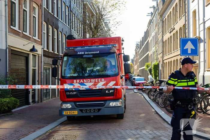 Grote brand in portiekwoning