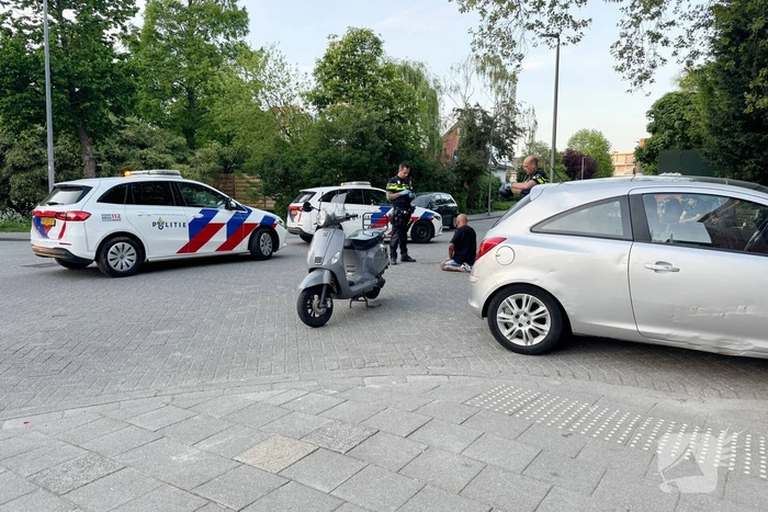 Scooterrijder in botsing op kruising