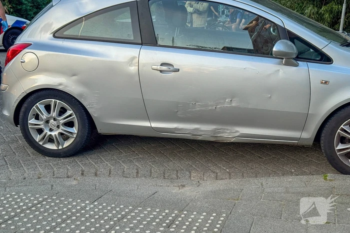 Scooterrijder in botsing op kruising