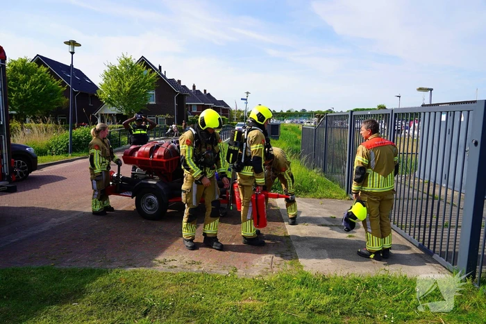 Brandweer aan de slag met blussen van bootbrand