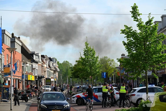 Veel rookontwikkeling bij brand in appartementen boven winkels