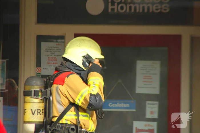 Veel rookontwikkeling bij brand in appartementen boven winkels