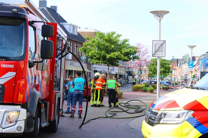 Veel rookontwikkeling bij brand in appartementen boven winkels