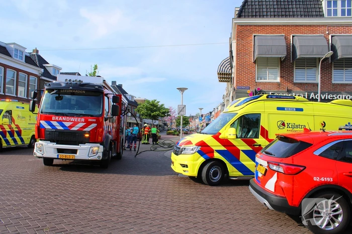 Veel rookontwikkeling bij brand in appartementen boven winkels