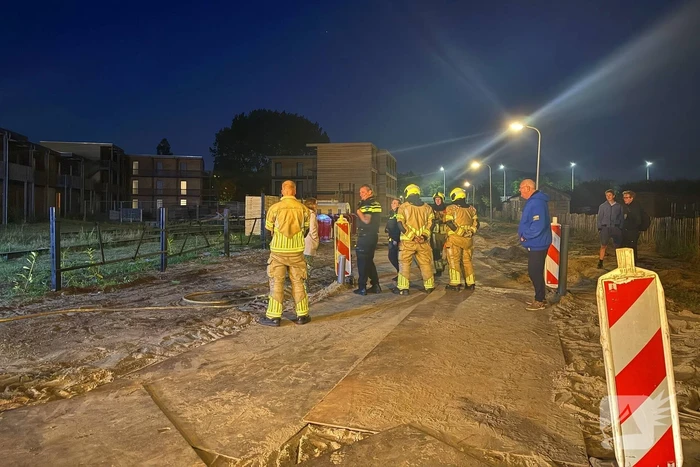 Brand in en naast ondergrondse container