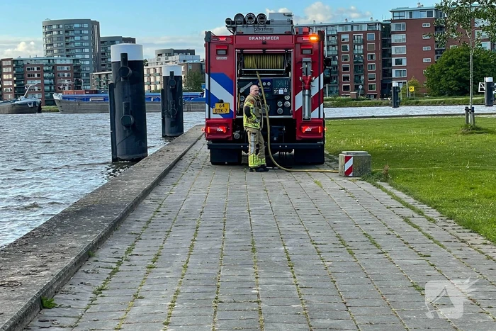 Brandende boom snel gedoofd
