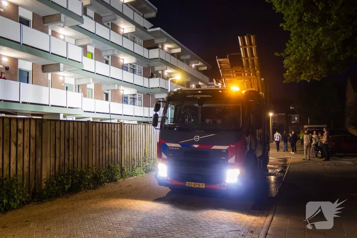 Scooter in brand gestoken achter flat