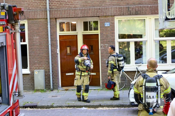 Grote brand in portiekwoning