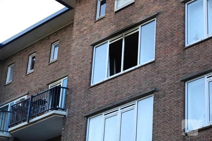 Evacuatie na brand in portiekwoning