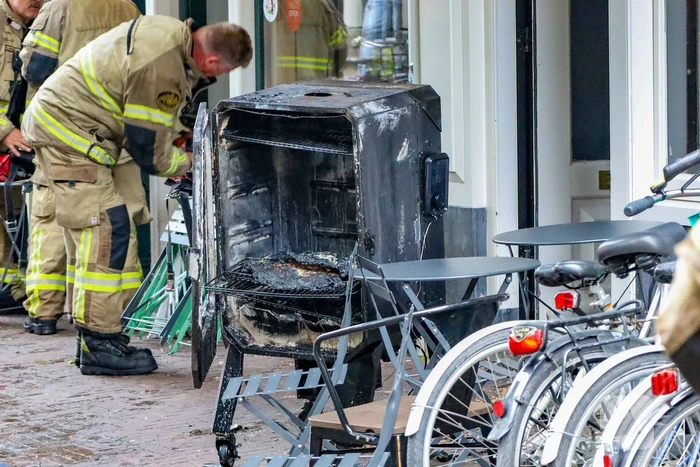 Brand in restaurant door grilloven