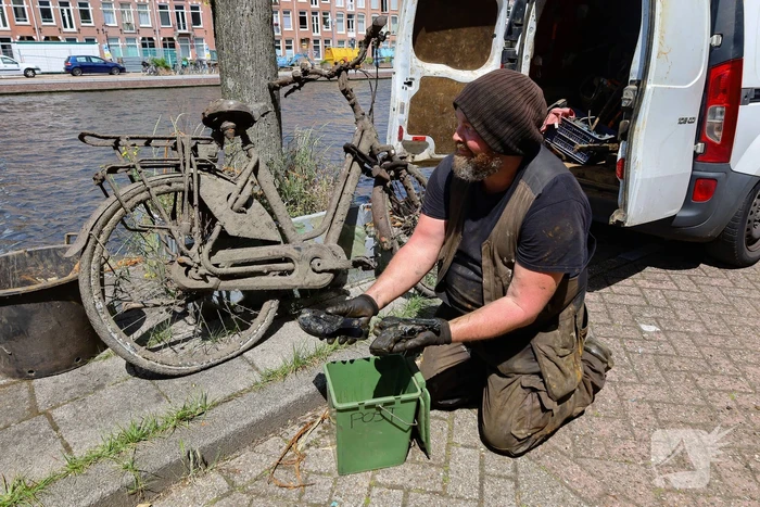 Magneetvisser vind pistool in gracht