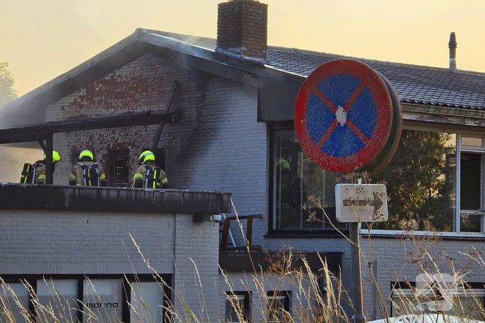 Uitslaande brand in winkelpand