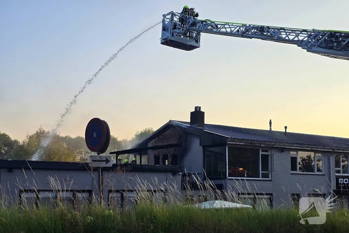 Uitslaande brand in winkelpand