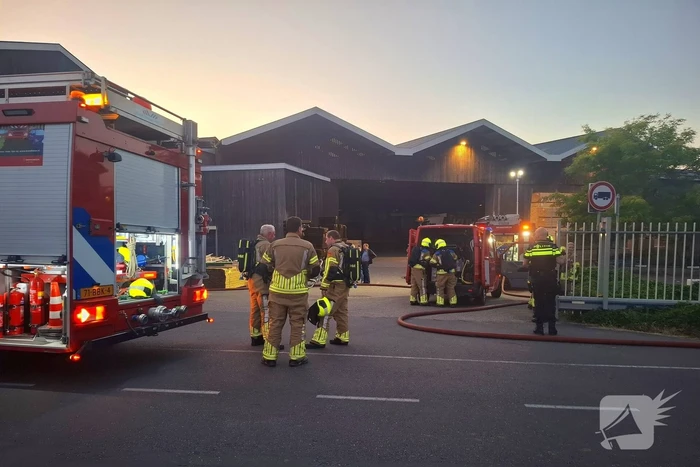 Machine in brand in houthandel