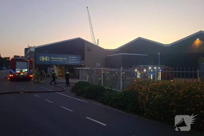 Machine in brand in houthandel