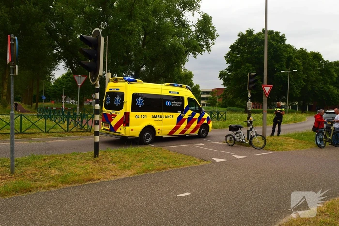Botsing driewielfiets en auto