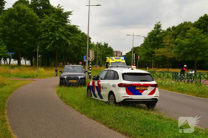 Botsing driewielfiets en auto