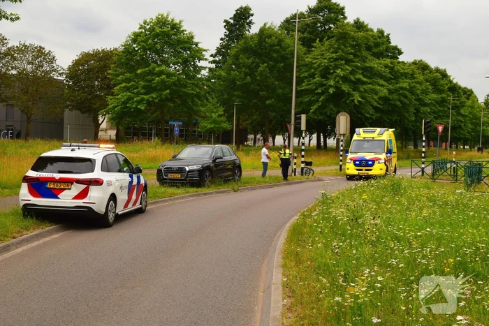Botsing driewielfiets en auto