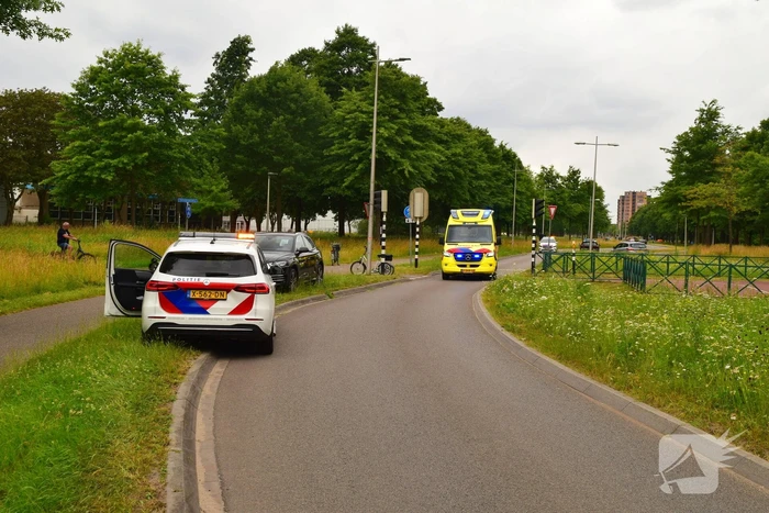 Botsing driewielfiets en auto
