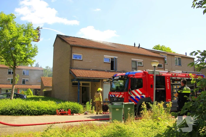 Grote uitslaande brand in woning