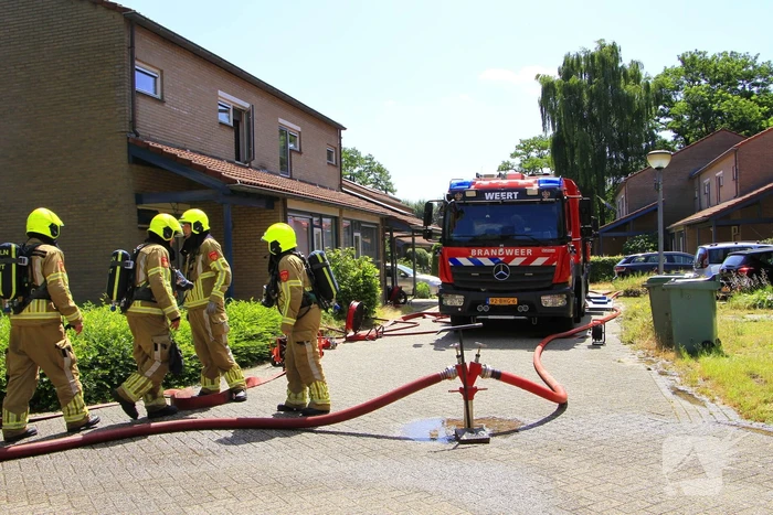Grote uitslaande brand in woning