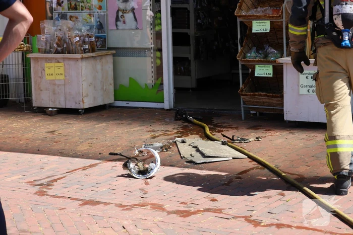 Brand in dierenwinkel snel geblust