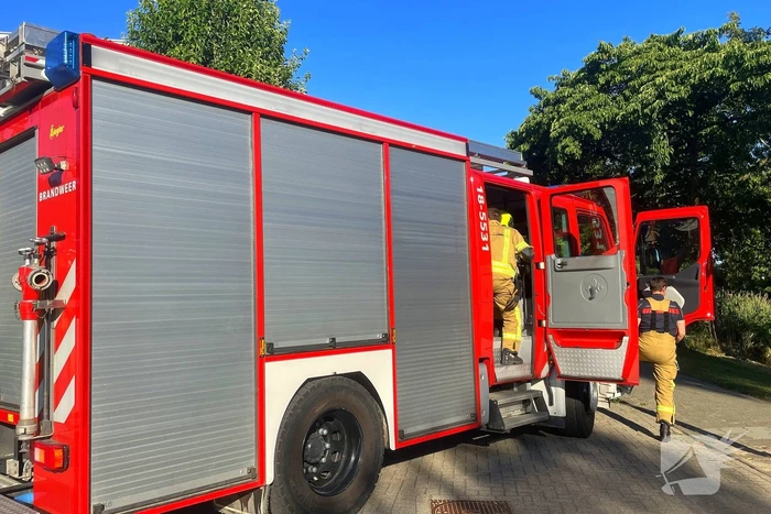 Vlammen gedoofd door buurtbewoners