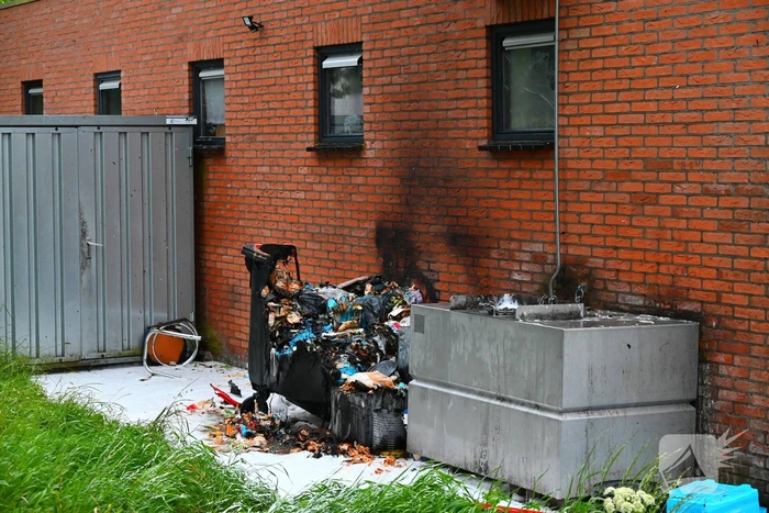 Containerbrand achter viswinkel