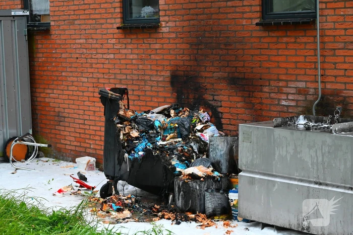Containerbrand achter viswinkel