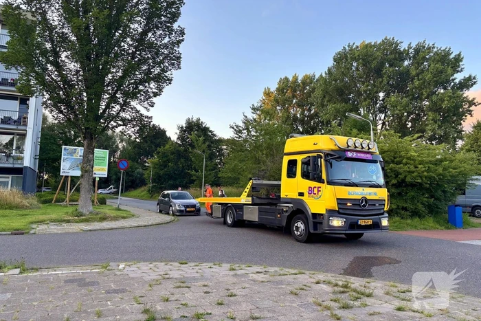 Automobilist en motorrijder met elkaar in botsing